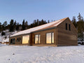 Classic Scandinavian timber frame house with large windows