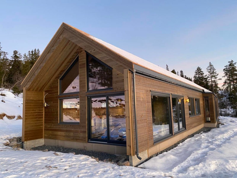 Scandinavian-style timber frame private house with large windows