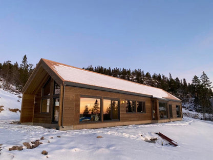 Modern timber private house in Scandinavian design with large panoramic windows